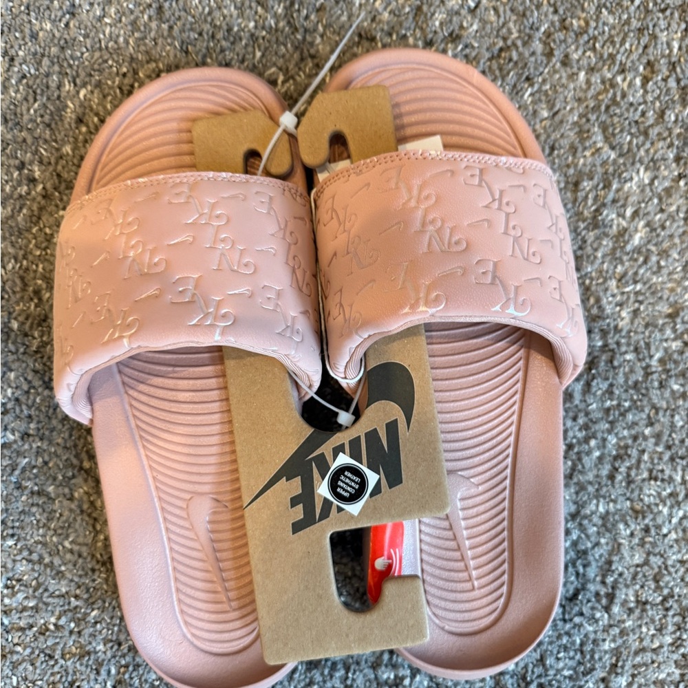 Nike Embossed Pink Slides